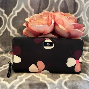 Very good condition black floral nylon Kate Spade zippered wallet